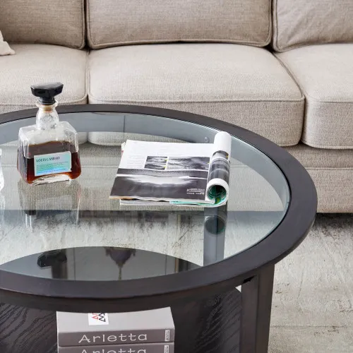 Round Black Wood Coffee Table with Glass Top, 36" — top view of round tempered-glass surface