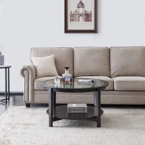 Round Black Wood Coffee Table with Glass Top, 36" — close-up of black wood lower shelf and frame